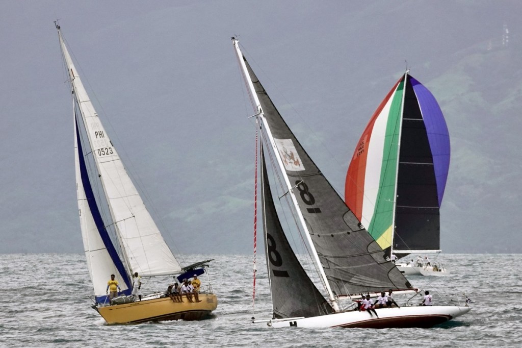 All Souls Regatta, Royal Cargo, PGYC, Puerto Galera Yacht Club, SBP Optimist, Verde Island Passage, Coast Guard, Severe Tropical Storm, Paeng, David Wheeler, Freewheeler, Bellatrix, Karakoa, Hurricane Hunter, Athena, Papaya II, Irresistible, Cape North, Fleeting Glimpse, Philippine Sailing Association, Royal Cargo, Broadwater Marine, Lane Moving & Storage, Lane Archive Technologies, Tricom Projects, Philippine Retirement Authority, Tanduay, Wireless Link, Semper Green Energy, Wisdom, Asia Yachting, Nature’s Spring Magwai, Bayan Ng Puerto Galera, Philippine Department of Tourism, Philippines Sailing Association, Philippine Coast Guard, Philippine Maritime Police