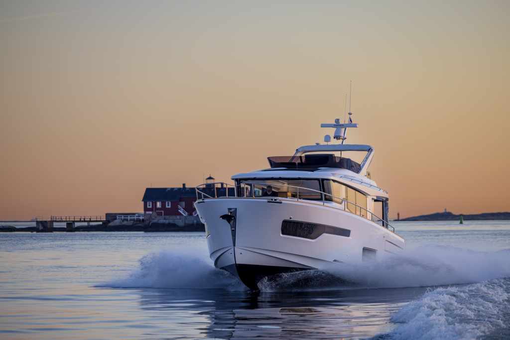 Introducing the Nimbus Flybridge 495 Nimbus flybridge 495 new coupé passenger flow on the Nimbus flybridge 495 Large glass windows on the Nimbus flybridge 495 Kitchen onboard the Nimbus flybridge 495 Nimbus flybridge 495 coupé’s salon