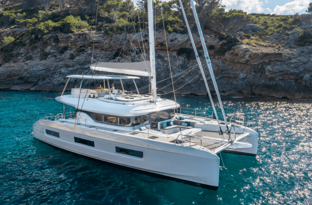 Lagoon 60 Lagoon 60 in Menorca Lagoon 60 cutter rig The Lagoon 60’s flybridge is huge Platform and stairs on Lagoon 60 Aft cockpit on Lagoon 60 Lagoon 60 catamaran